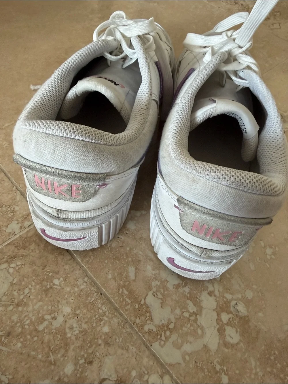 Nike Women’s White Low-Top Sneaker with Purple Swoosh Accent